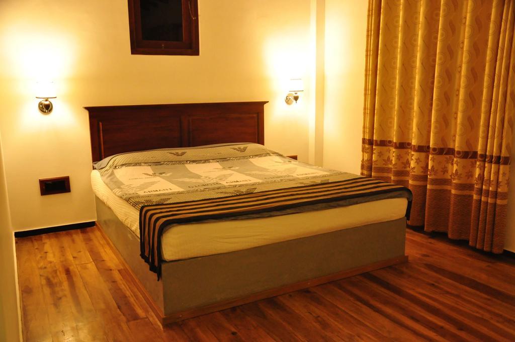 أونا واتونا Asantha Guest House الغرفة الصورة