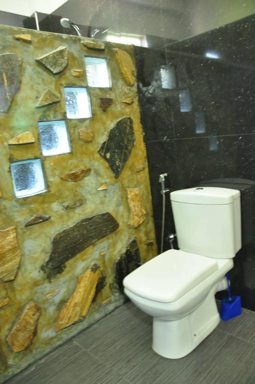 أونا واتونا Asantha Guest House الغرفة الصورة